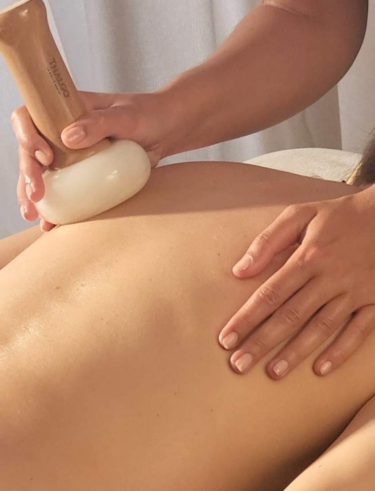 Massage Signature au Galet Chauffant